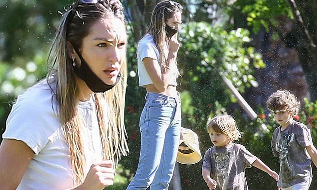 Candice Swanepoel children playing together outdoors